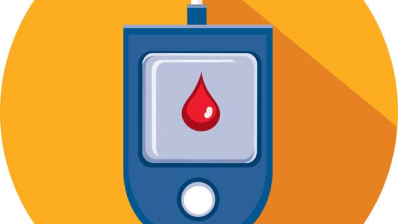 Blood Sugar Meter in orange circle